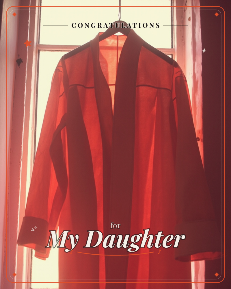 A red robe hangs from a wooden hanger against a bright window, its sheer fabric glowing from the backlight and its folds falling in soft vertical lines, a graduation e-card design