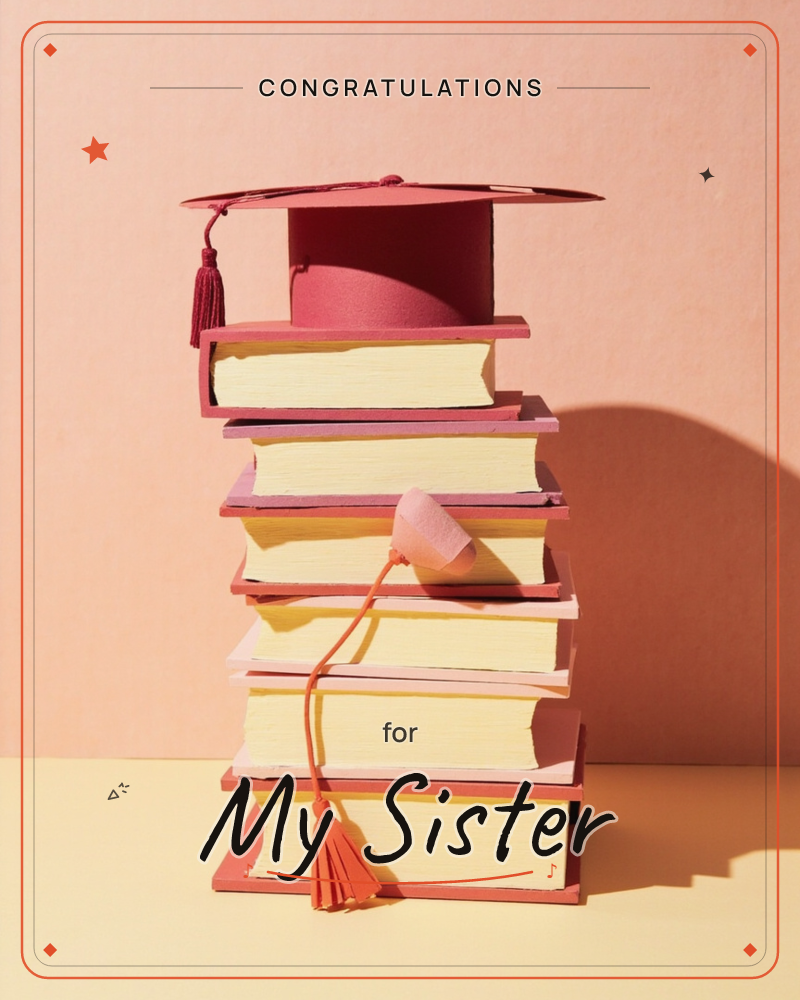 A miniature graduation cap with its tassel dangling sits perched atop a tall stack of pink-covered books with cream pages, cast in warm, dramatic side…, a graduation e-card design