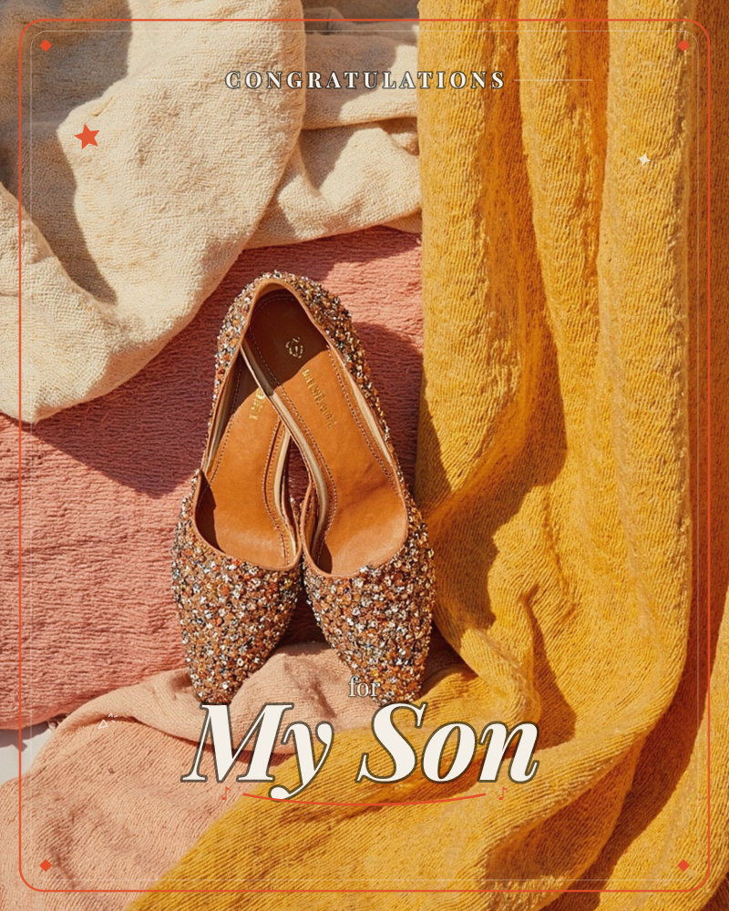 A pair of jewel-encrusted flats catches the sunlight against a backdrop of draped fabric in cream, dusty pink and mustard yellow, a graduation e-card design