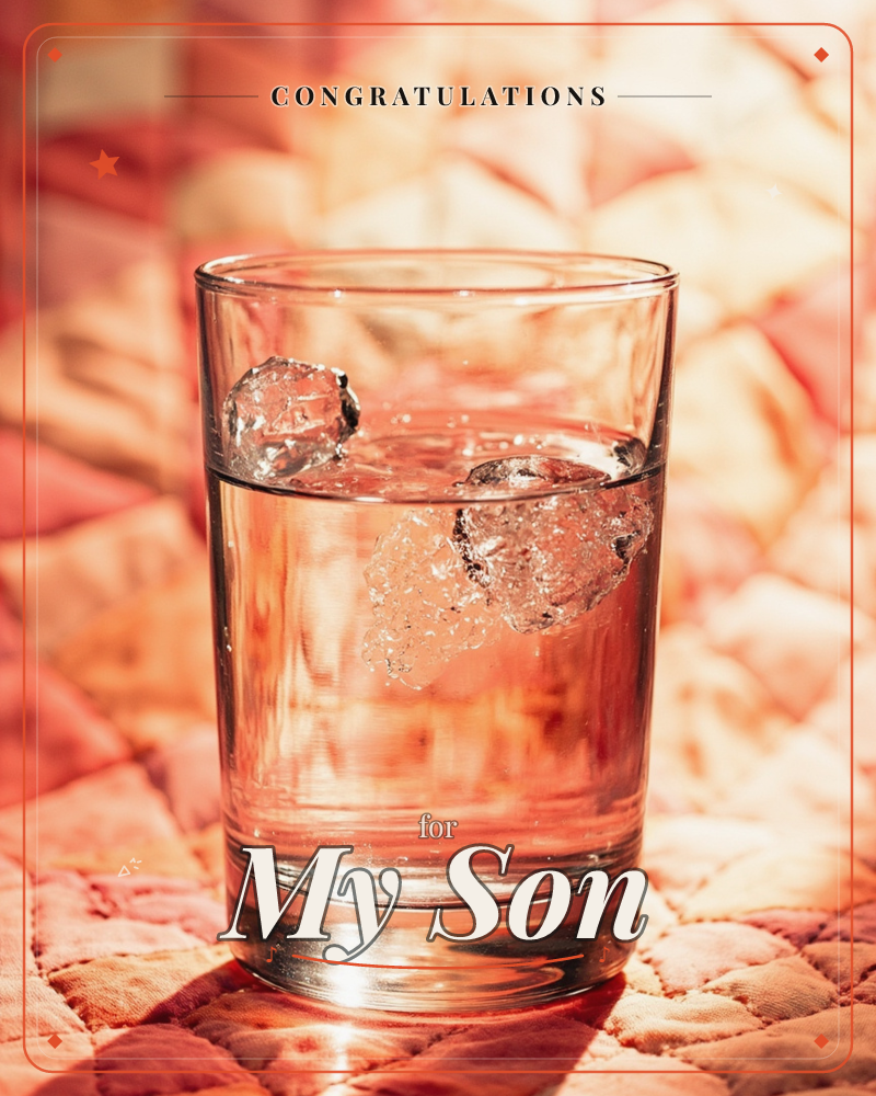 A glass of water with ice cubes catching the light sits on a quilted fabric backdrop, everything bathed in a warm coral-pink glow, a graduation e-card design
