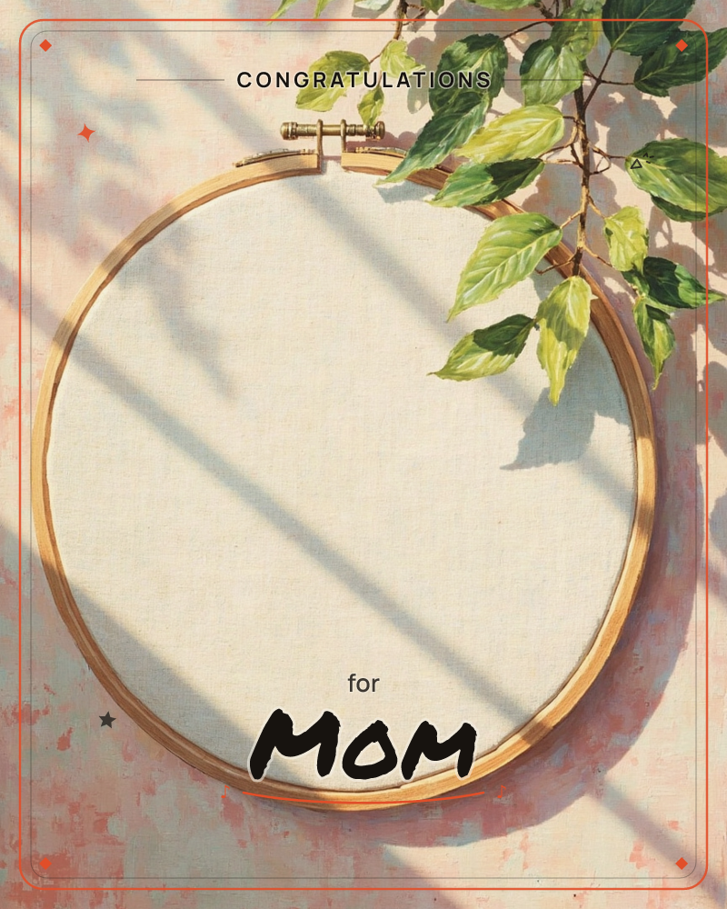 A round wooden embroidery hoop holds a blank stretch of cream linen against a mottled pink-plaster wall, a graduation e-card design