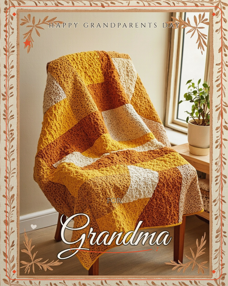 A chunky patchwork knit blanket in shades of mustard, rust, and cream is draped over a wooden chair beside a sunlit window, a grandparents day e-card design
