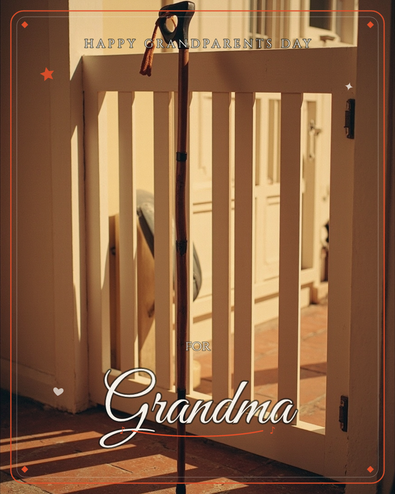 A wooden walking stick with a leather wrist strap leans against a white slatted gate, warm late-afternoon sun casting long bar shadows across the…, a grandparents day e-card design