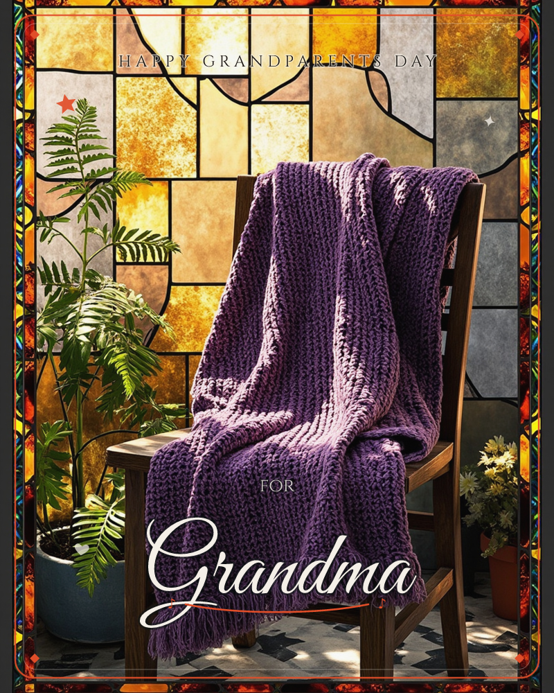A chunky purple knitted throw with fringed edges is draped over a wooden chair, set before a stained-glass window of warm amber and grey panes, a grandparents day e-card design