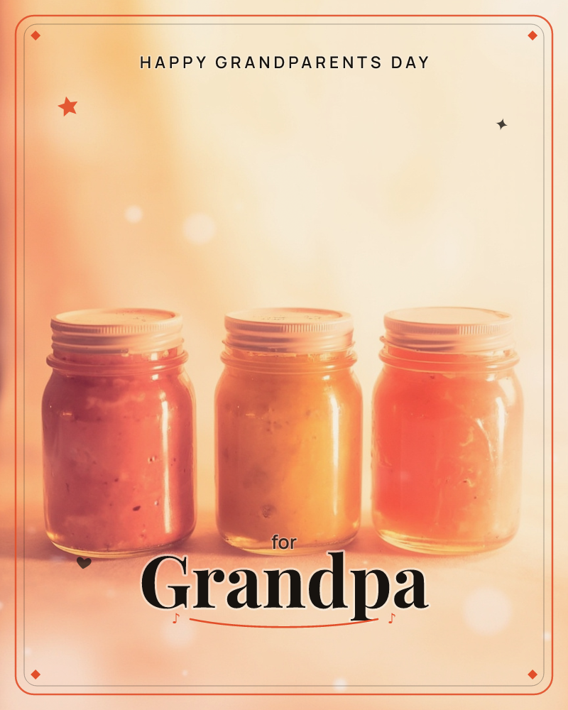 Three glass jars of homemade preserves stand in a row on a warm, sun-washed surface, their contents glowing red, gold and amber against a hazy peach…, a grandparents day e-card design