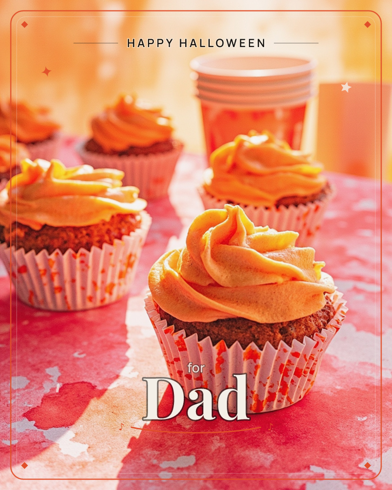 A row of cupcakes with swirled orange frosting sits on a sunlit table splashed with pink and coral watercolour patterns, a halloween e-card design