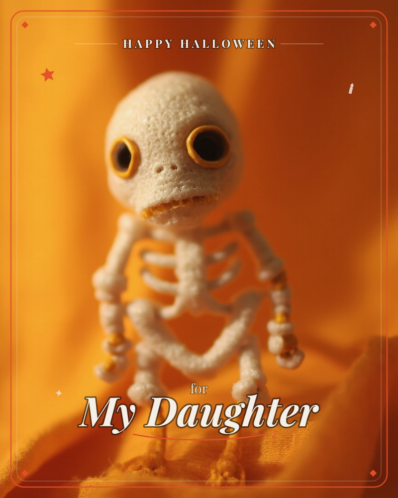 A tiny handcrafted skeleton figure with a round textured skull and big golden-rimmed eyes stands on rumpled orange fabric, a halloween e-card design
