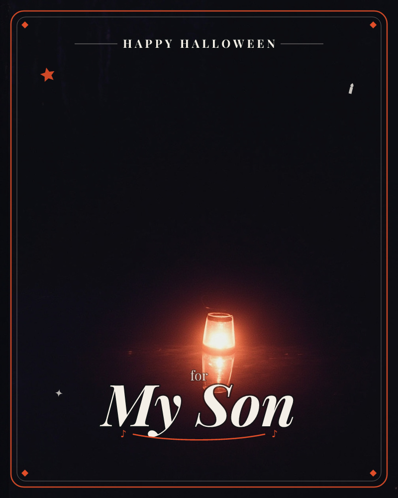 A single glass lantern glows deep orange-red against total darkness, its flame reflected in a faint sheen on the surface below, a halloween e-card design