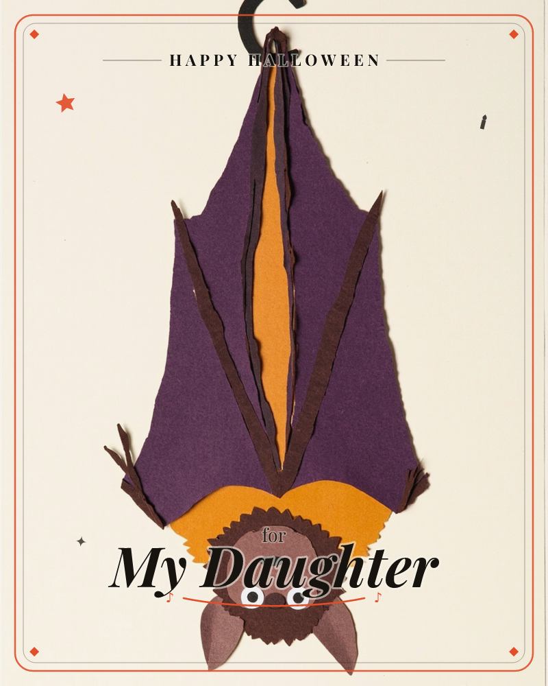 A cut-paper bat hangs upside down from a curled black hook, its purple wings folded into sharp torn-edged points with an orange stripe down the centre, a halloween e-card design