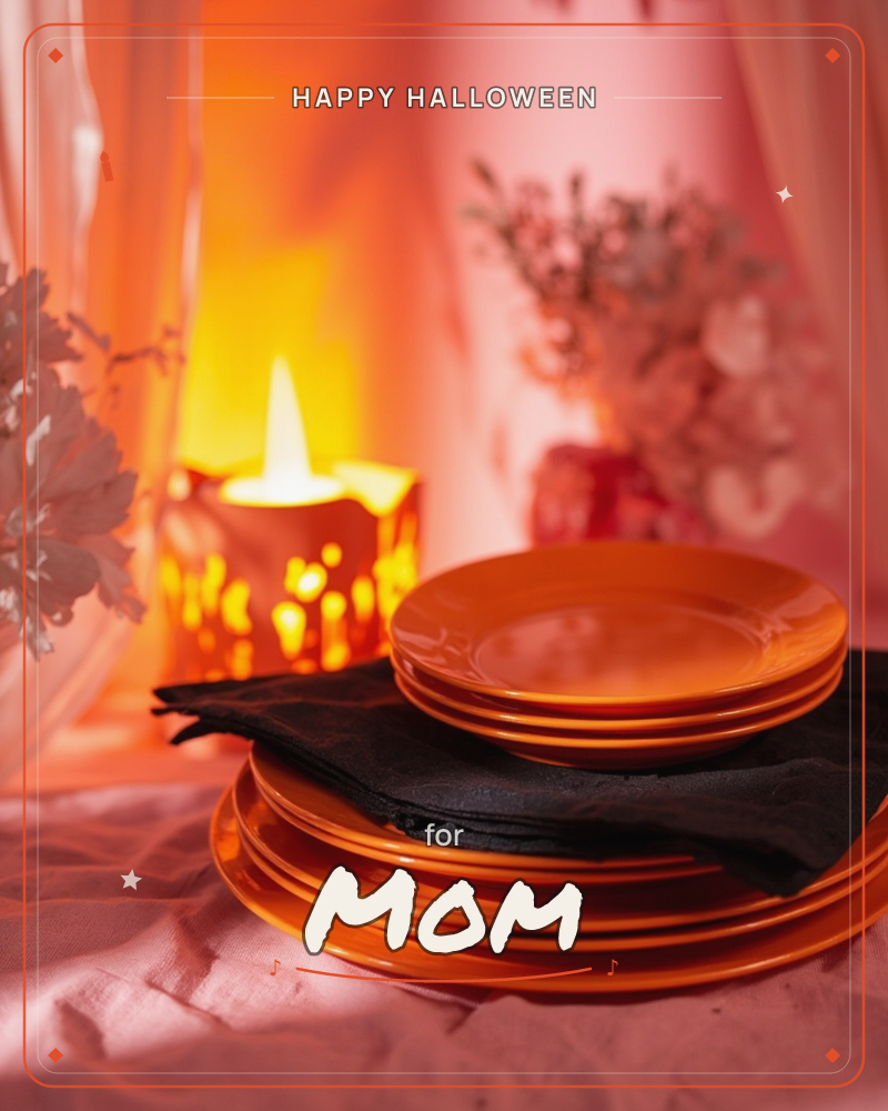 A stack of glossy orange plates rests on a black cloth napkin, glowing under warm candlelight beside sheer curtains and dried floral sprigs, a halloween e-card design