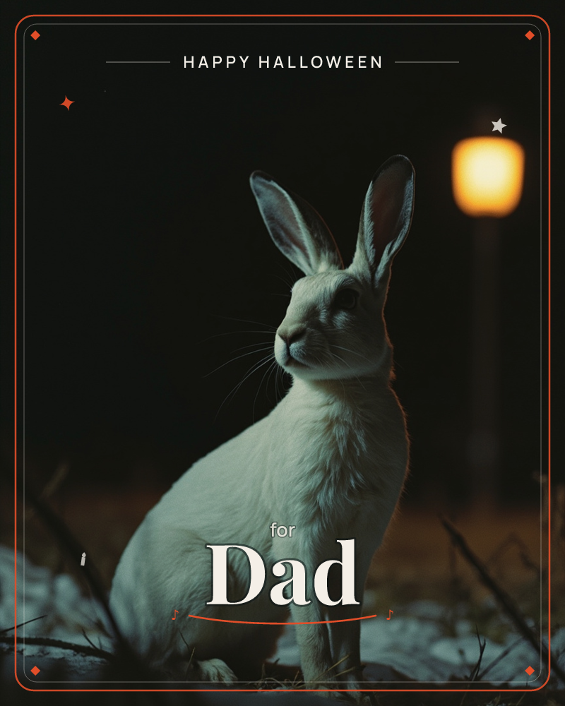 A white rabbit sits upright on snowy ground in near-total darkness, ears alert and nose catching a faint glow, a halloween e-card design