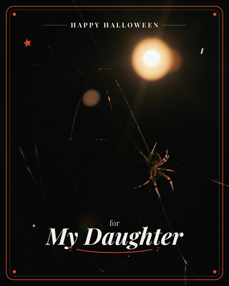 A spider sits at the centre of its web against near-total darkness, its silk threads catching a single warm light glowing in the upper right corner, a halloween e-card design