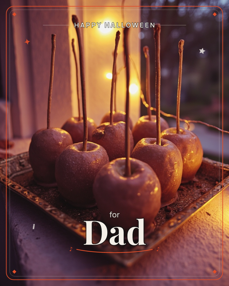 A cluster of glossy toffee apples on wooden sticks sits on an ornate metal tray beside a window, glowing amber in the light of a string of fairy lights, a halloween e-card design
