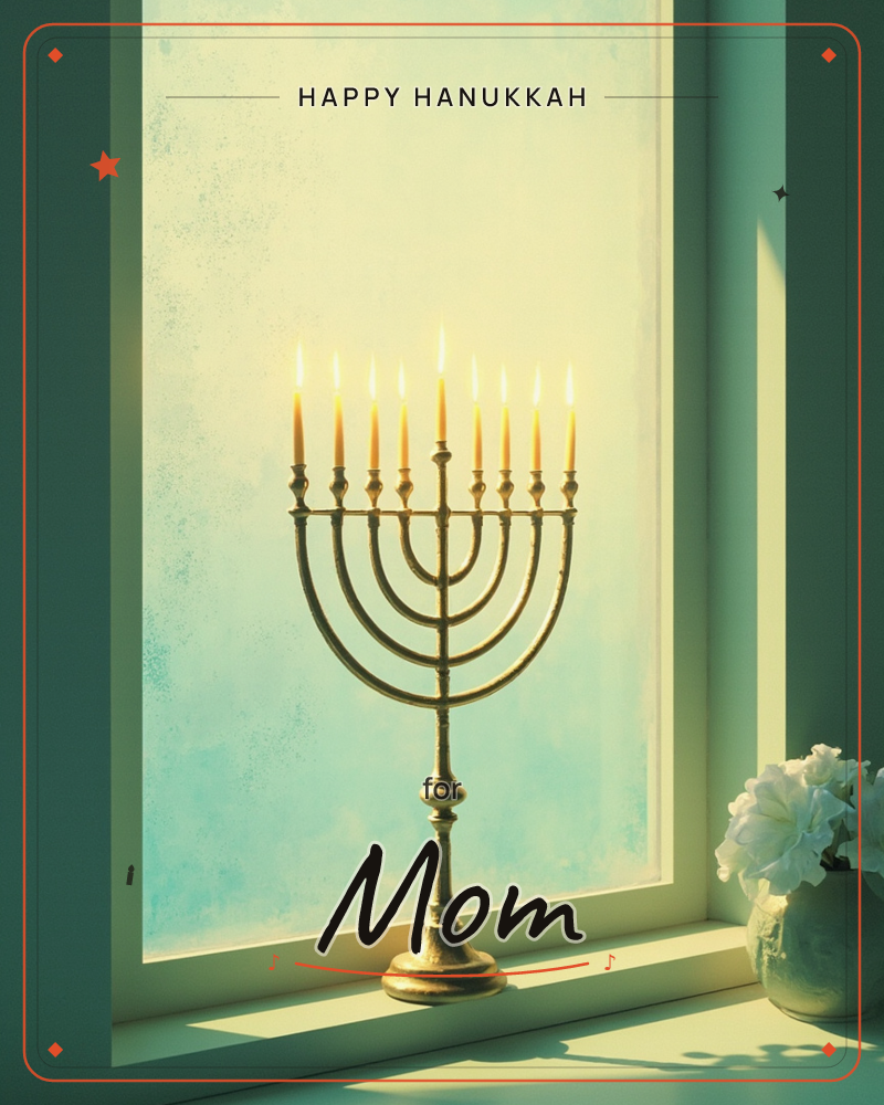 A brass menorah stands on a windowsill with all nine candles lit, glowing against a pale turquoise pane touched with gold light, a hanukkah e-card design