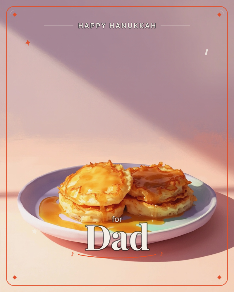A stack of golden pancakes drizzled with syrup sits on a pastel plate, lit by a sharp diagonal shaft of warm light against a dusty pink wall, a hanukkah e-card design