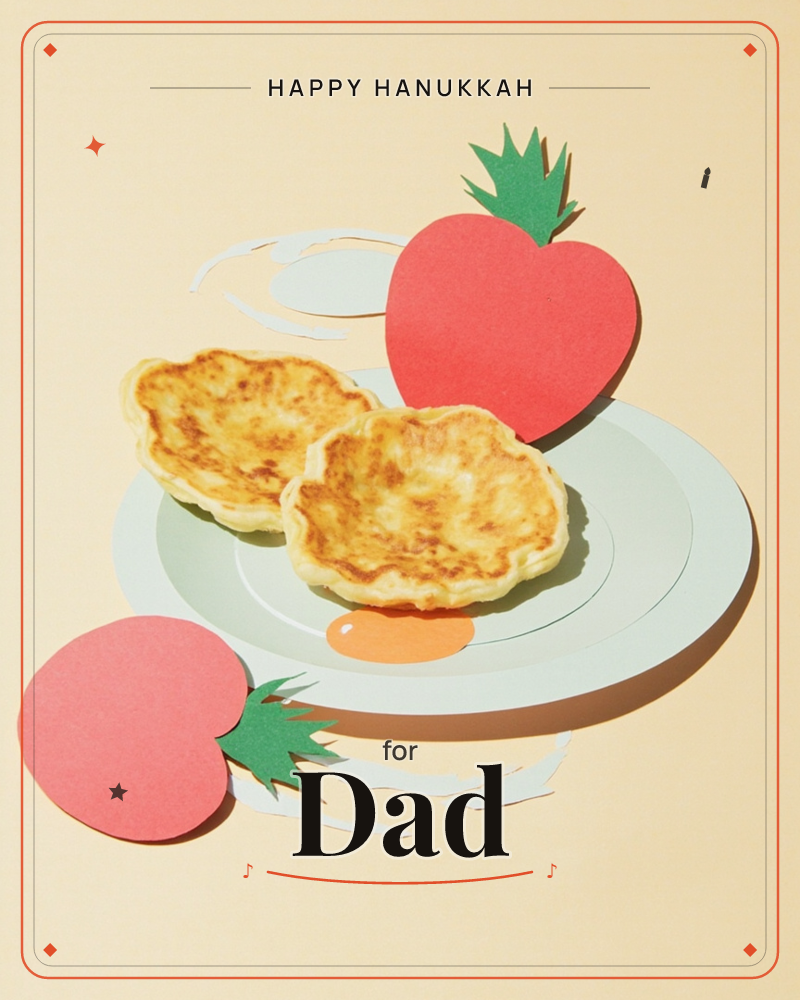 A pale plate holds two golden pancakes with a swirl of syrup, set against a soft peach background, a hanukkah e-card design