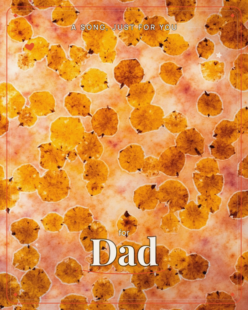 A dense scatter of golden-yellow round shapes, like pressed flowers or leaves, covers the page in overlapping clusters against a soft blushed-peach…, a just because e-card design
