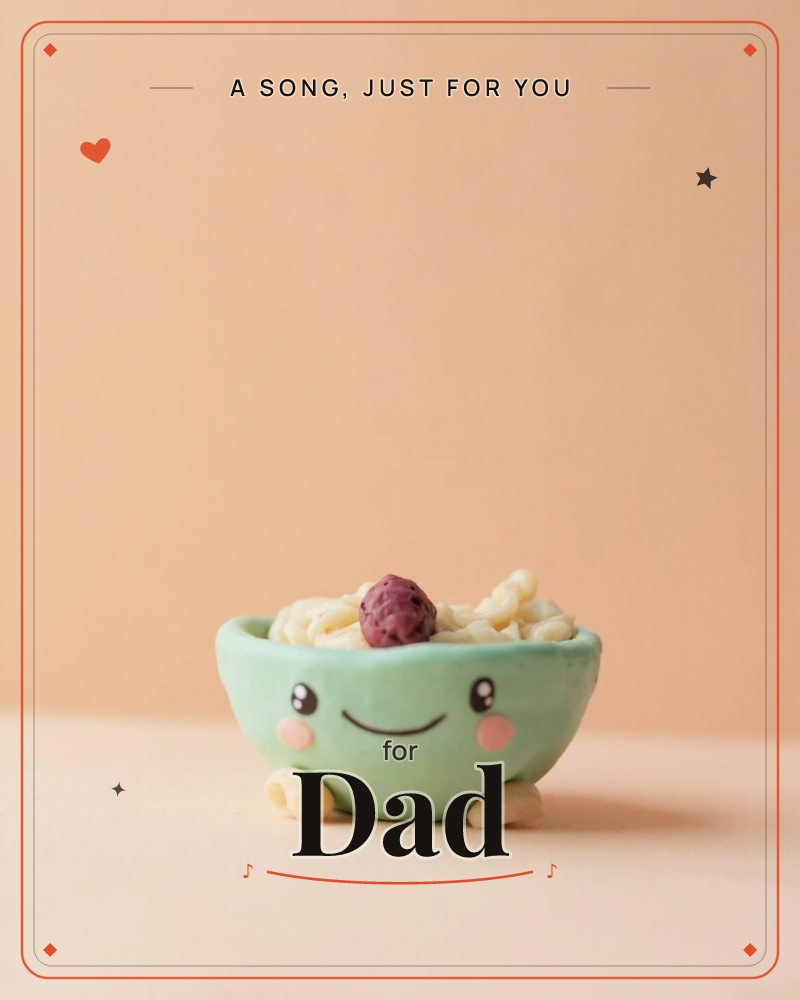 A small mint-green bowl with a smiling cartoon face sits against a warm peach backdrop, filled with pasta-like curls and topped with a single dark berry, a just because e-card design