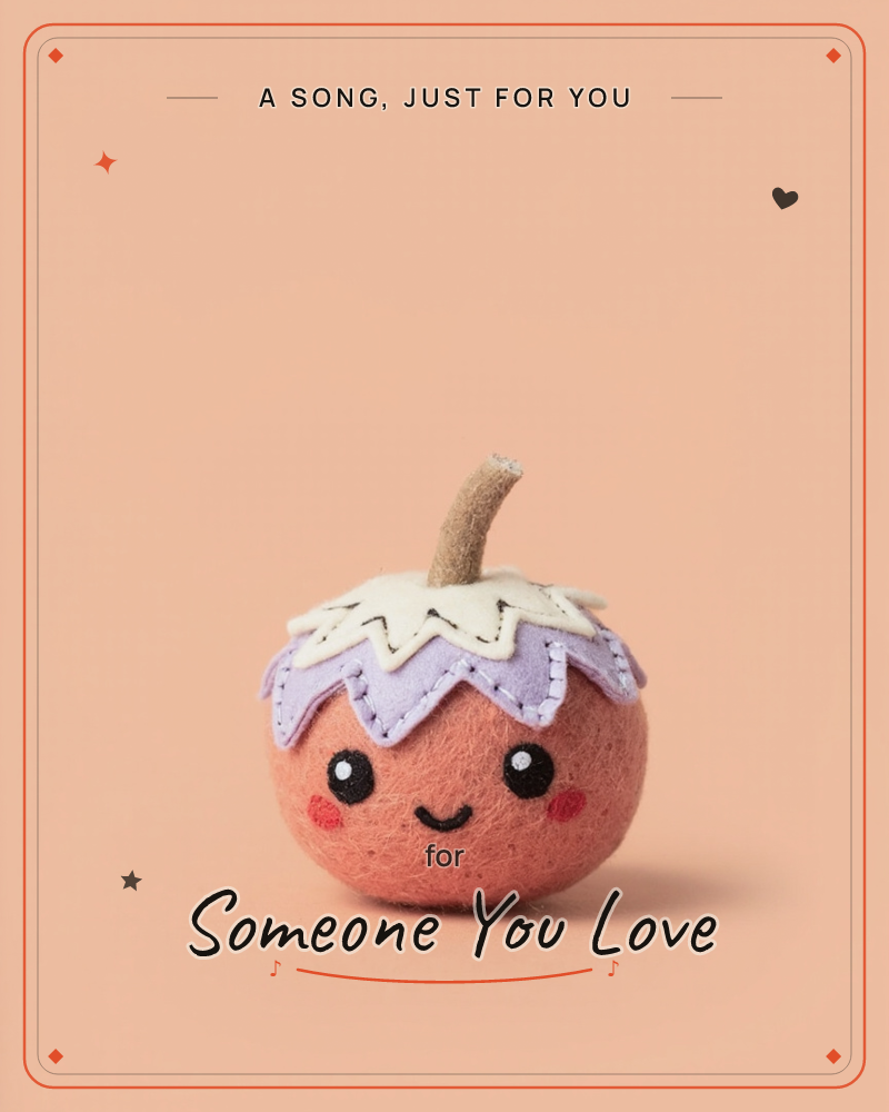 A small felt pumpkin character with a stitched zigzag cap of cream and lilac felt and a fuzzy brown stem sits against a plain peach-toned background, a just because e-card design