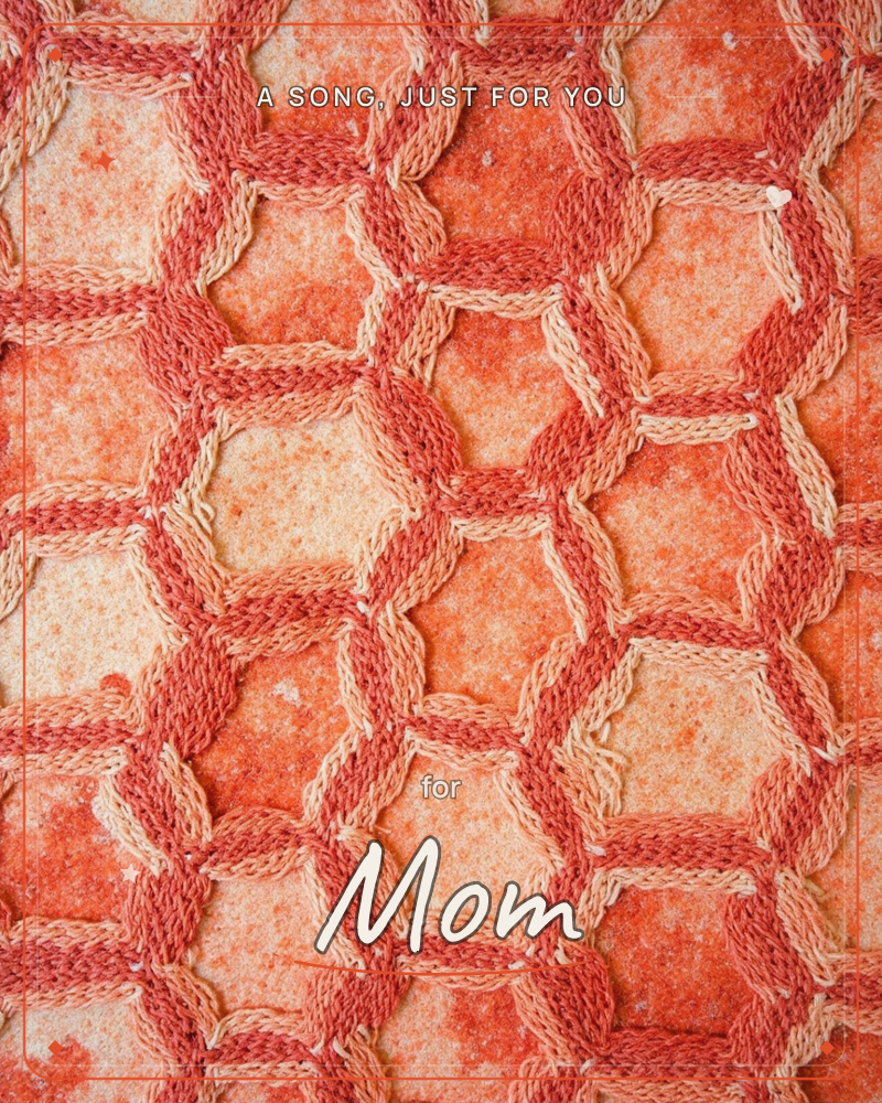 A close-up of interlocking crocheted rings in shades of coral and warm pink, forming a honeycomb-like lattice over a mottled orange-and-cream textured…, a just because e-card design