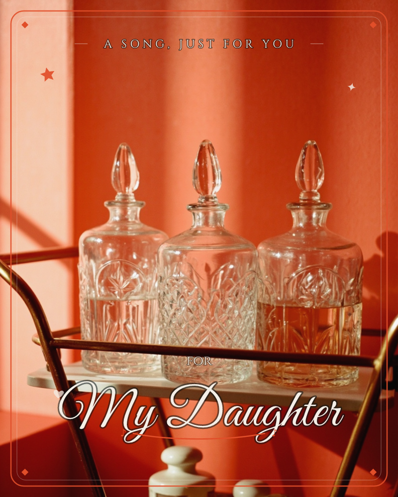 Three cut-glass decanters with faceted stopper tops sit side by side on the white marble shelf of a brass bar cart, glowing amber against a warm…, a just because e-card design