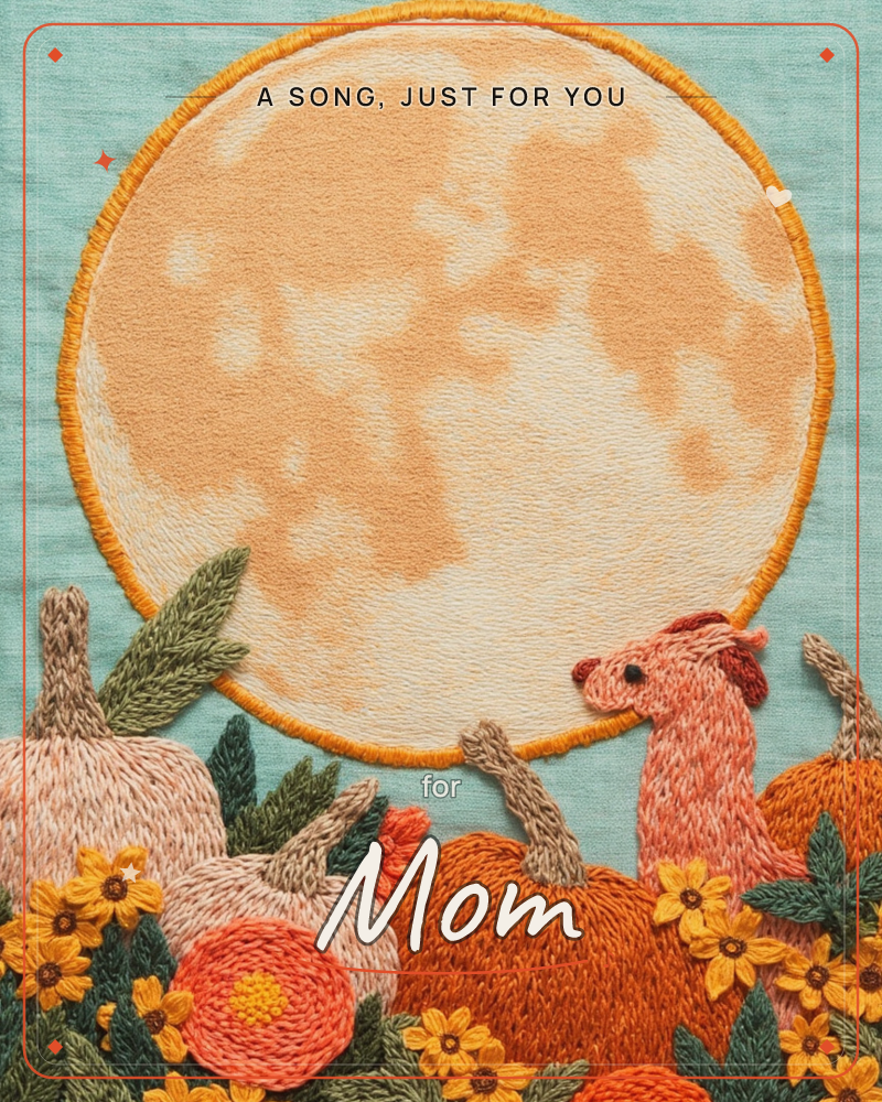 An embroidered harvest moon glows in soft orange thread against a teal linen sky, its surface stitched with cratered texture, a just because e-card design