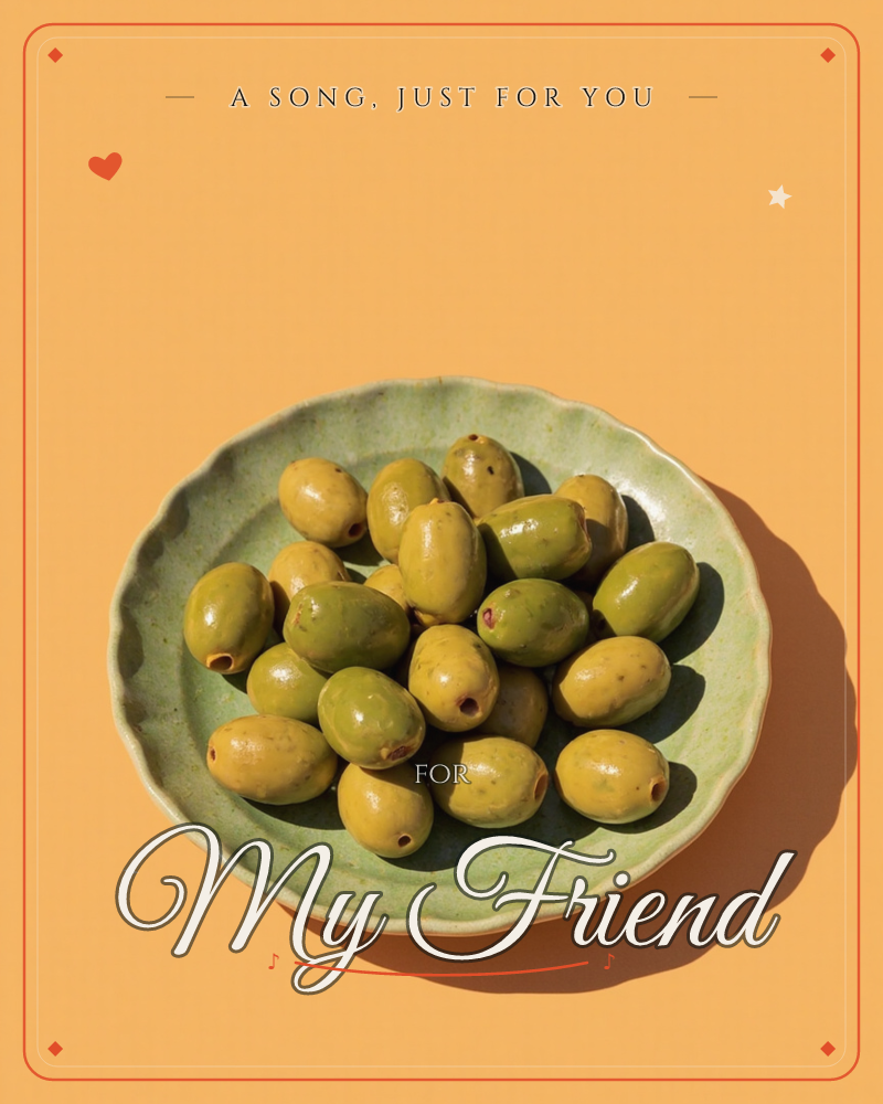 A shallow, hand-thrown ceramic dish with a scalloped rim holds a heap of pitted green olives, photographed from directly above against a warm…, a just because e-card design