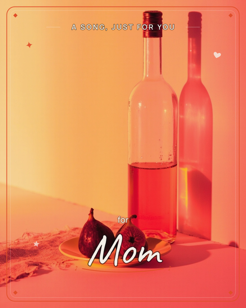 A still life bathed in warm amber and rose light shows a glass bottle of pale pink wine casting a bold red shadow on the wall behind it, with two ripe…, a just because e-card design