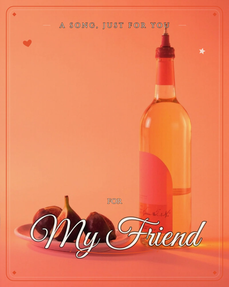 A tall bottle of golden wine with a pink label stands beside a white plate of dark figs, one sliced open to show its red flesh, a just because e-card design