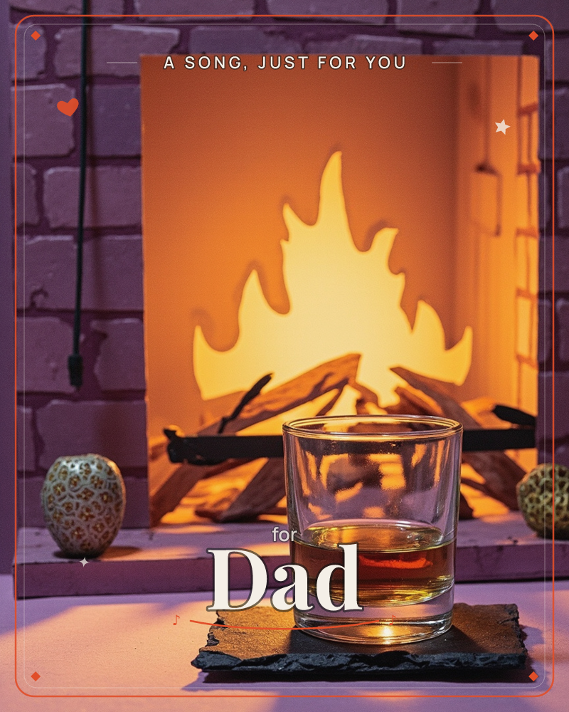 A paper-craft brick fireplace glows with a cut-out flame shape lit from behind, logs stacked neatly on the grate, a just because e-card design