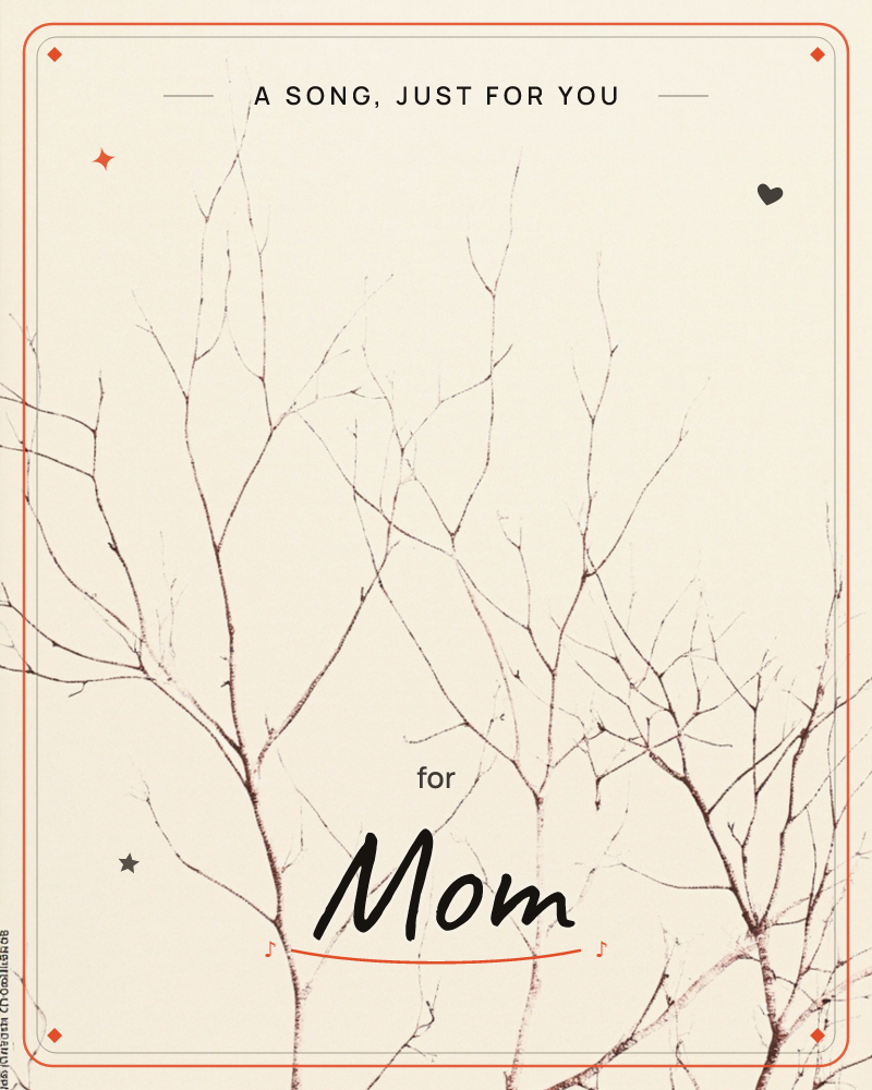 Bare, slender branches fork upward against a plain cream background, rendered in soft sepia-brown tones, a just because e-card design
