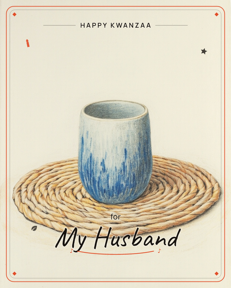 A hand-drawn ceramic cup sits alone on a woven straw coaster, its glaze streaked in deep blue drips fading up into pale grey-white, a kwanzaa e-card design