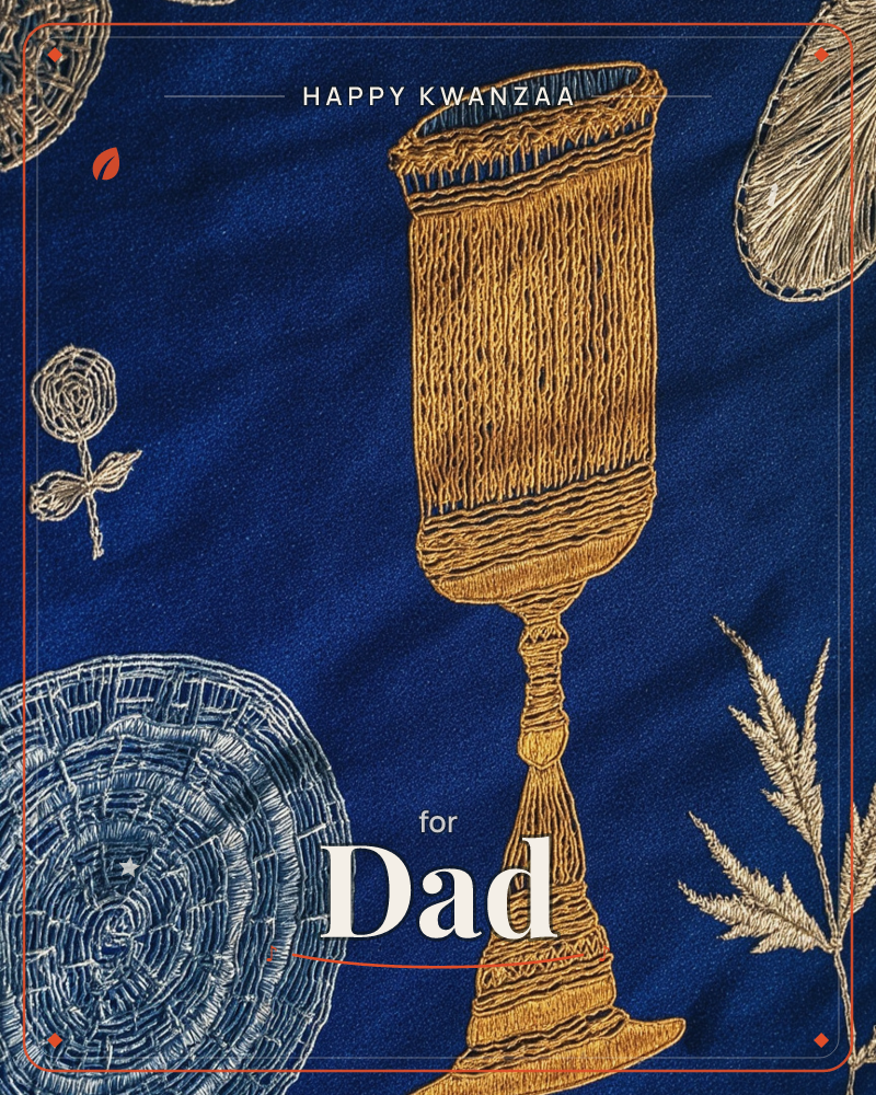 A deep navy fabric ground holds an embroidered goblet-shaped vessel stitched in golden thread, its ridged body catching the light like woven straw, a kwanzaa e-card design