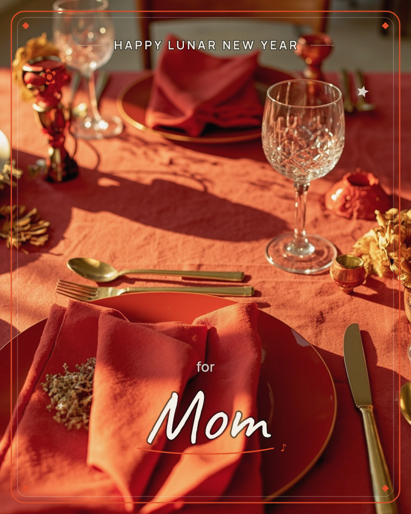 A formally set dining table glows in warm evening light, dressed entirely in terracotta and rust tones, a lunar new year e-card design