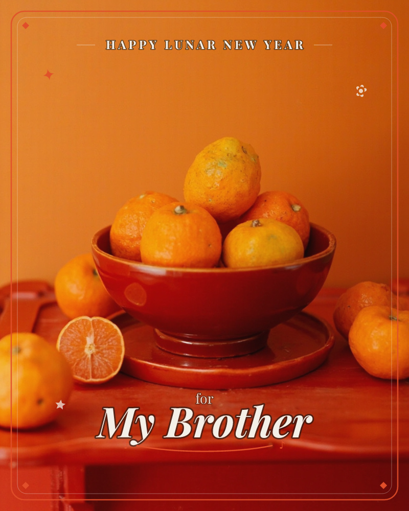 A red glazed bowl heaped with citrus sits on a matching red wooden table against a warm burnt-orange wall, with extra mandarins and one halved fruit…, a lunar new year e-card design