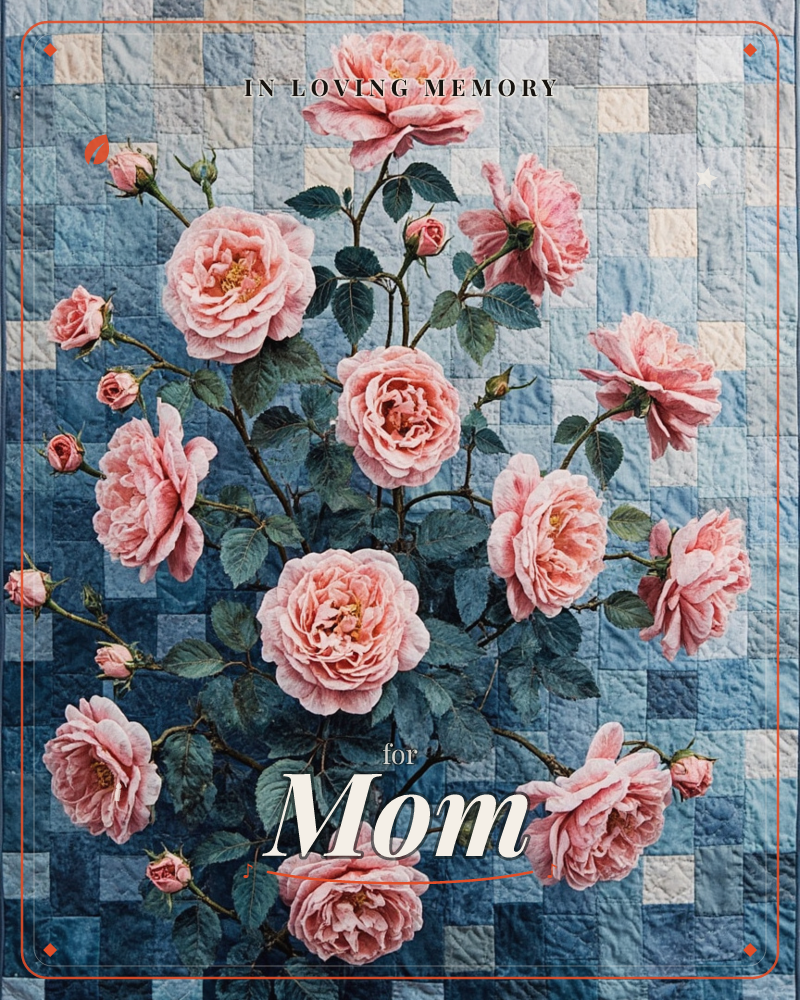 A lush spray of full-blown pink roses climbs across a patchwork of denim-blue quilted squares, their petals rendered in soft, ruffled detail with deep…, a memory e-card design