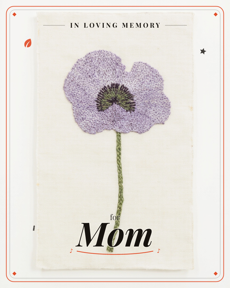 A single lavender poppy is embroidered onto plain unbleached linen, its petals built from hundreds of fine radiating stitches around a dark stitched…, a memory e-card design
