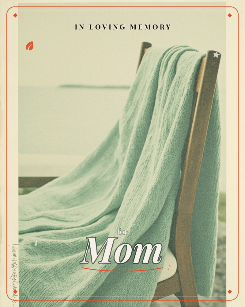 A soft mint-green knitted throw is draped over the back of a wooden chair, with a hazy stretch of water and shoreline visible behind it, a memory e-card design