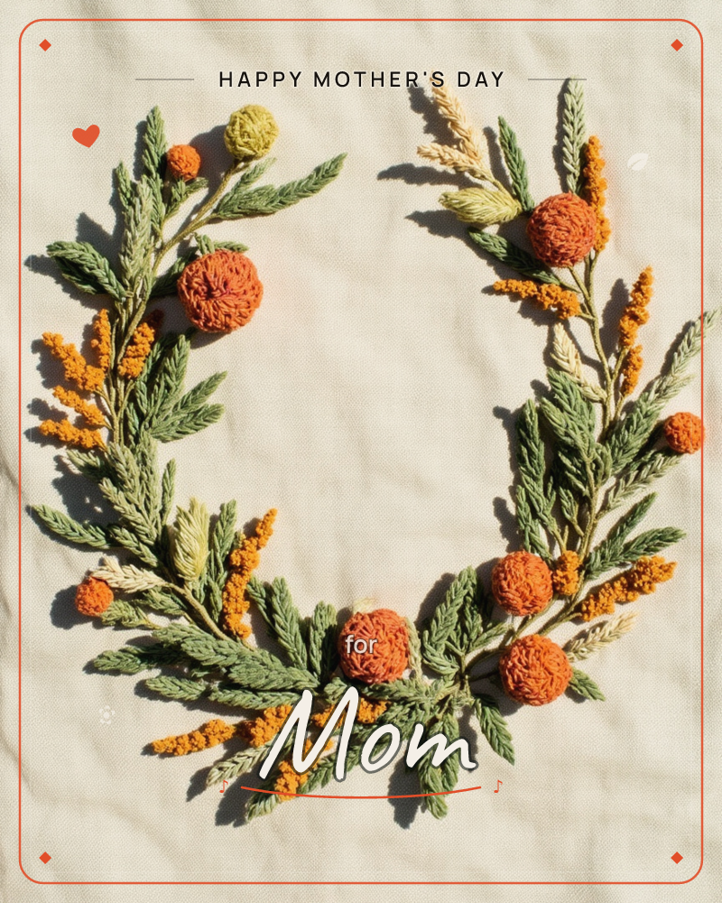 An embroidered wreath sits on natural linen, stitched from feathery green fern fronds and clusters of orange pom-pom flowers with sprays of tiny…, a mothersday e-card design