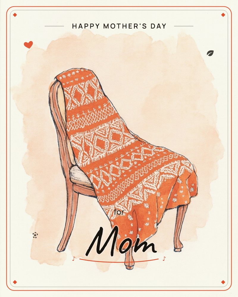 A wooden chair with curved legs sits against a soft peach watercolour wash, draped in a chunky orange fair-isle knit blanket patterned with diamonds…, a mothersday e-card design
