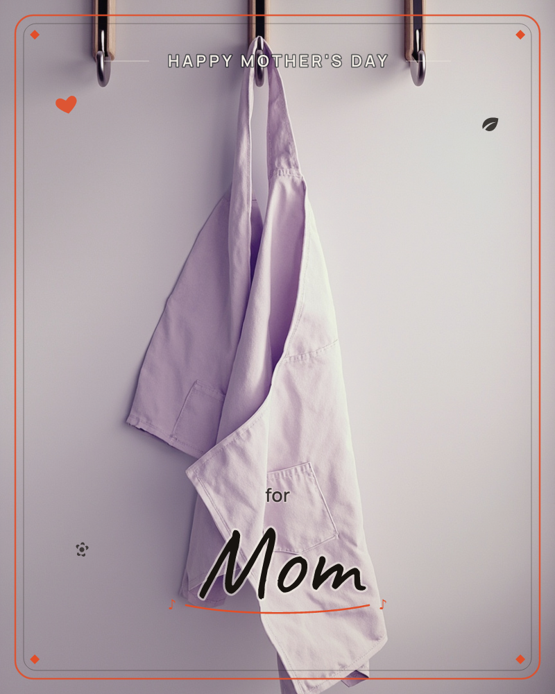 A plain apron hangs from a wall hook, its fabric catching a soft vignette of light against a bare wall, a mothersday e-card design