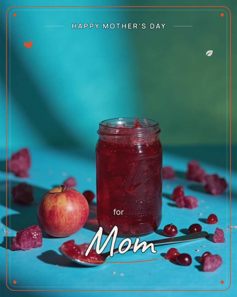 A glass jar of deep red jam sits on a vivid teal surface, backlit against a teal-and-green draped backdrop, a mothersday e-card design