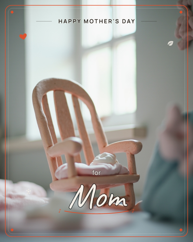 A tiny wooden rocking chair sits by a soft-focus window, a small pink knitted blanket draped over its seat, a mothersday e-card design