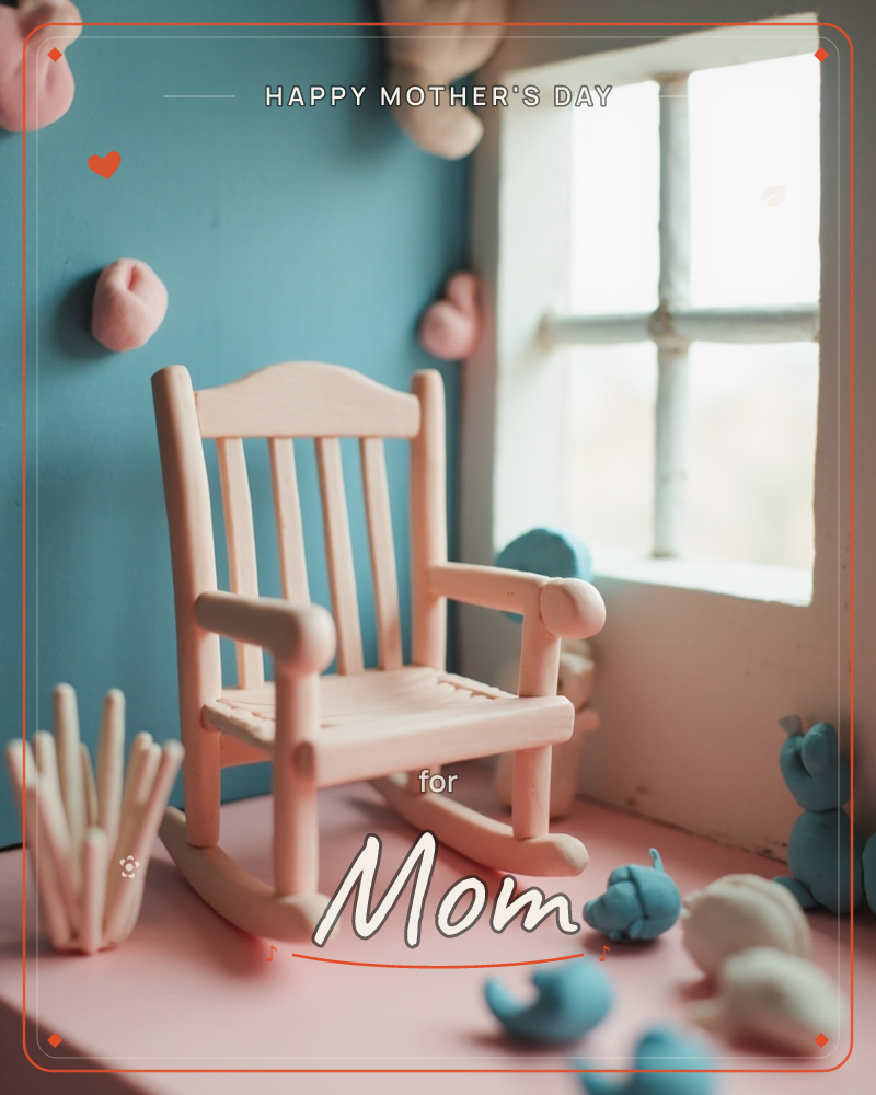 A miniature wooden rocking chair sits in a dollhouse-scale room with teal walls and a pink floor, sunlight pouring through a small paned window, a mothersday e-card design