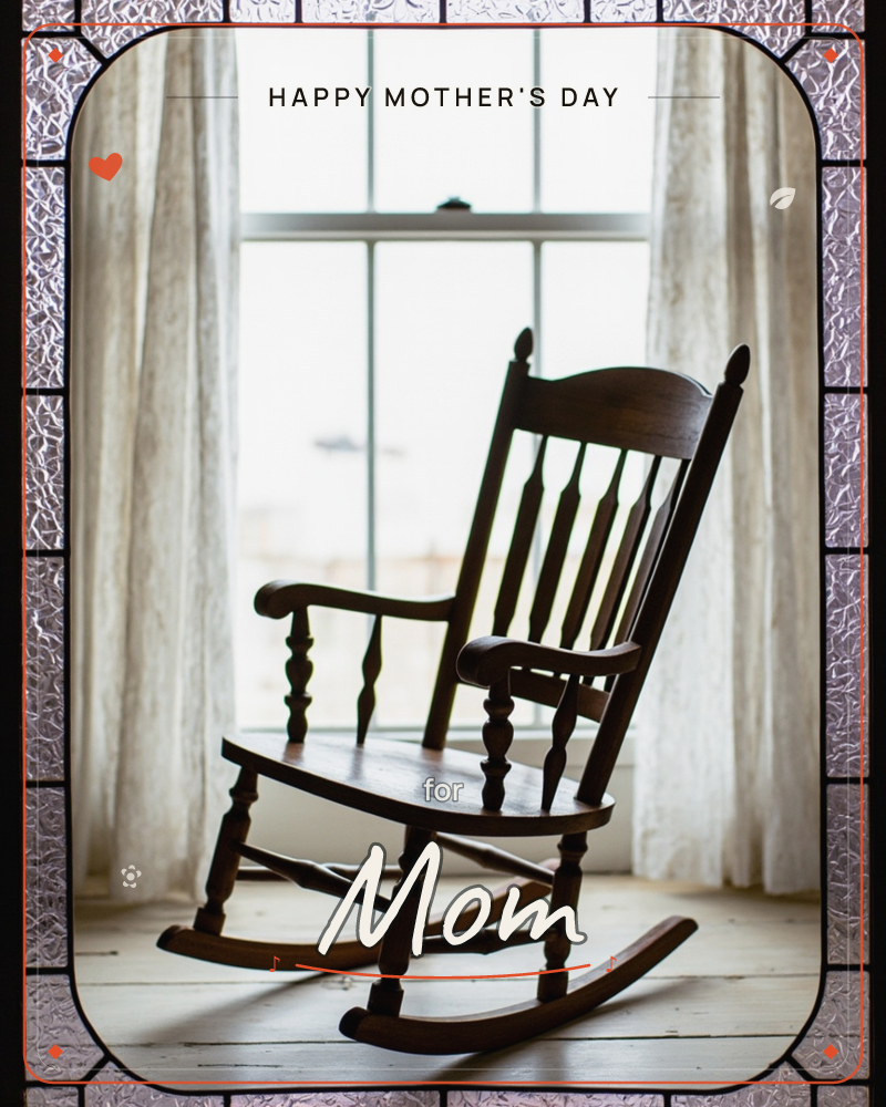 An empty wooden rocking chair sits silhouetted before a tall window hung with sheer, gauzy curtains, framed by a textured leaded-glass border, a mothersday e-card design