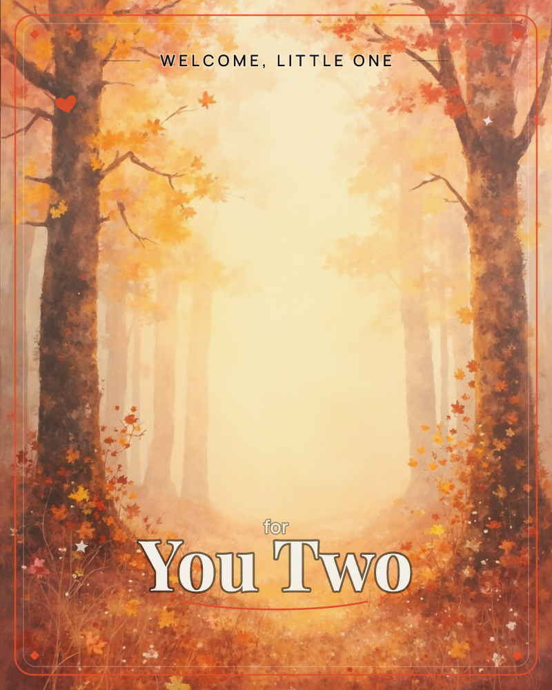 Two tall autumn trees frame a misty woodland path, their branches arching together over a glowing golden clearing beyond, a new baby e-card design