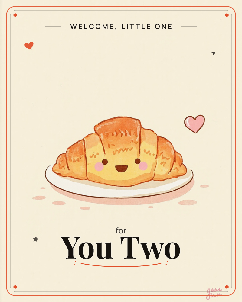 A cheerful golden croissant with a smiling face and pink blushed cheeks sits on a white plate, a small pink heart floating beside it, a new baby e-card design