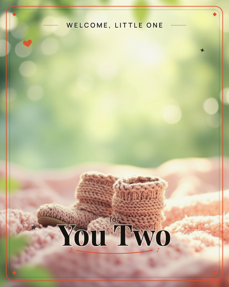 A tiny pair of knitted booties in dusty pink sit atop a soft, fuzzy blanket, with a dreamy green bokeh of sunlit leaves glowing behind them, a new baby e-card design