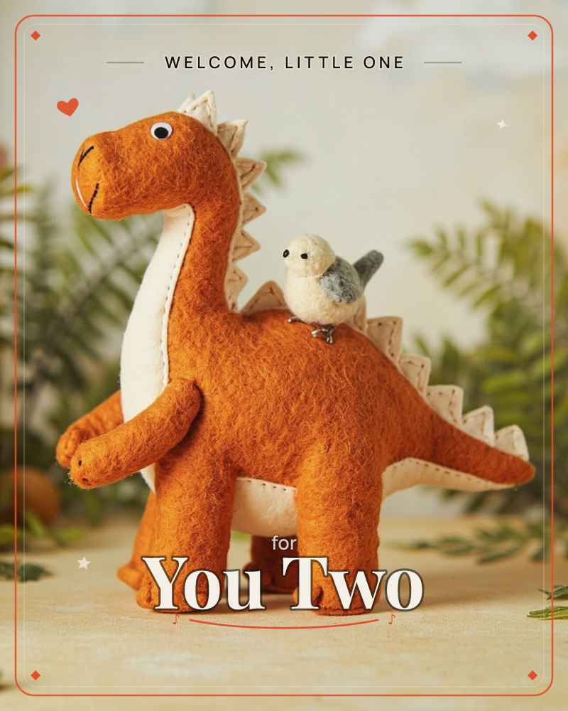 A handmade felt dinosaur toy stands against a soft neutral backdrop with ferns in the background, its long neck curved gently and cream underbelly and…, a new baby e-card design