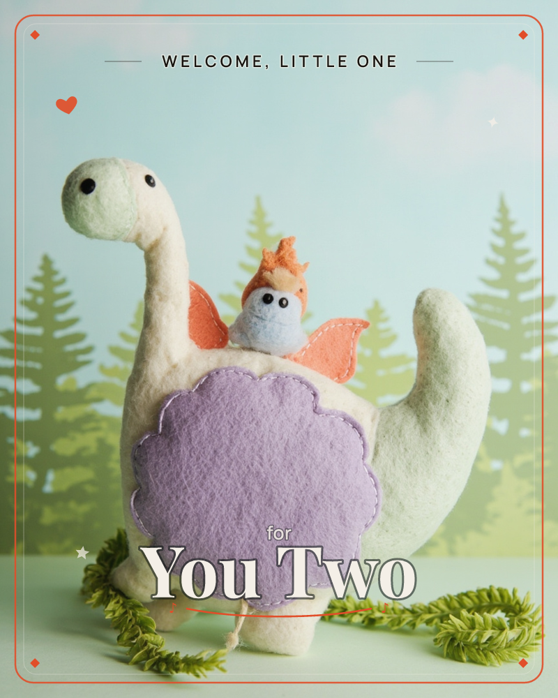 A soft felt dinosaur toy stands against a painted backdrop of pale green pine trees and a mint sky, a scalloped lavender patch stitched onto its round…, a new baby e-card design